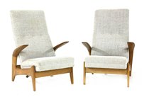 Lot 488 - A pair of teak armchairs