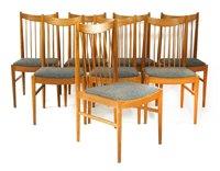 Lot 495 - A set of eight teak dining chairs