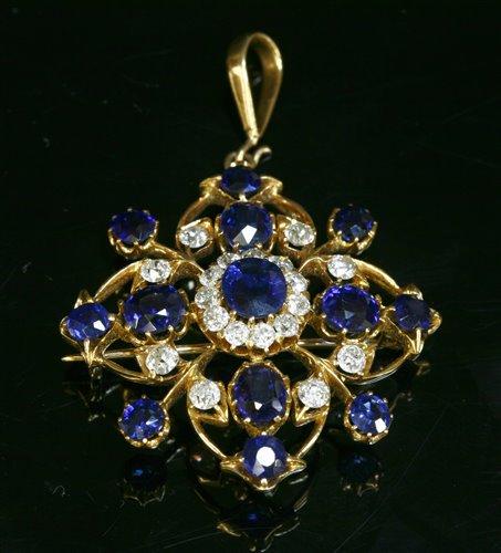 Lot 77 - A Victorian sapphire and diamond gold brooch/pendant, c.1890