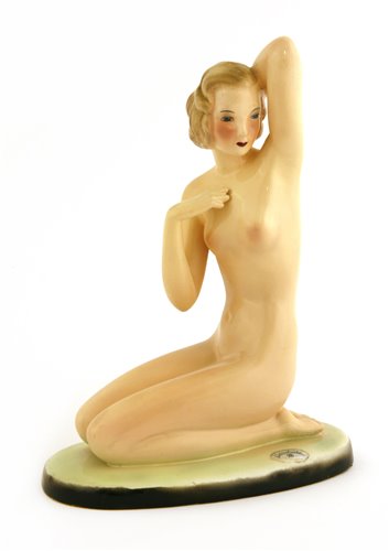 Lot 81 - A Goldscheider figure of a kneeling nude