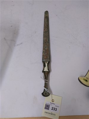 Lot 233 - Antiquities: four bronze daggers