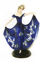 Lot 86 - A Goldscheider figure of a lady in a blue dress