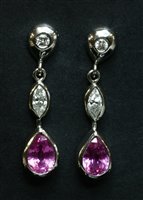 Lot 220 - A pair of 18ct white gold pink sapphire and diamond drop earrings
