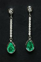 Lot 353 - A pair of 18ct white gold emerald and diamond drop earrings