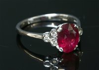 Lot 515 - An 18ct white gold ruby and diamond seven stone ring