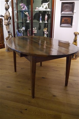 Lot 513 - A French Provincial walnut farmhouse table