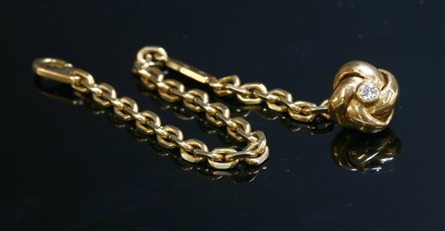 Lot 598 - A French gold diamond set key chain