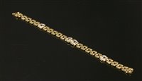 Lot 396 - An 18ct gold two row Panther link bracelet