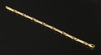 Lot 397 - An 18ct gold two row cable link bracelet