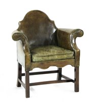 Lot 354 - A mahogany and green leather upholstered armchair