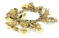 Lot 263 - A 9ct gold curb link chain with padlock