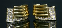 Lot 407 - A pair of 18ct gold diamond set earrings, by David Morris