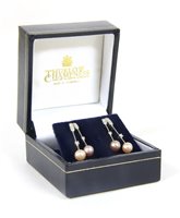 Lot 256 - A pair of white gold diamond and cultured pearl drop earrings