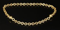 Lot 375 - A gold hollow trace link necklace and bracelet suite