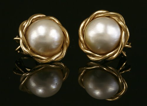 Lot 24 - A pair of 9ct gold mabe pearl earrings
