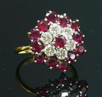Lot 378 - A gold ruby and diamond hexagonal cluster ring