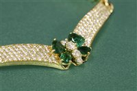 Lot 341 - An 18ct gold emerald and diamond butterfly necklace