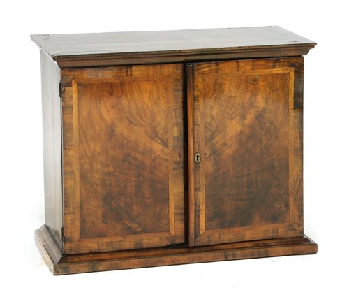 Lot 514 - A William and Mary walnut spice cabinet