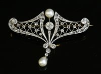 Lot 148 - A Belle Époque diamond and pearl set brooch/pendant, c.1910