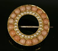 Lot 83 - A late Victorian gold, coral and split pearl circle brooch, c.1900