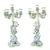 Lot 259A - A pair of Rockingham blue and white five branch candelabra