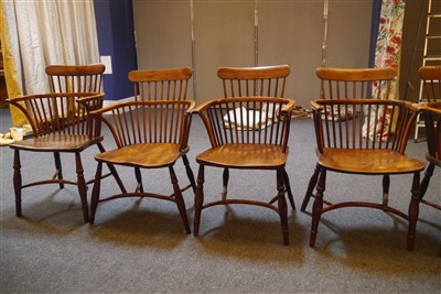 Lot 512 - An harlequin set of five early Victorian yew wood and elm Windsor chairs