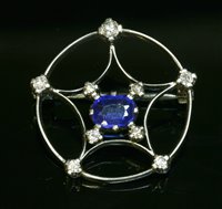 Lot 83 - A white gold doublet and diamond star and circle brooch