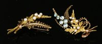Lot 233 - A 9ct two colour gold blue zircon and cultured pearl fern spray brooch