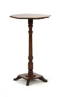 Lot 547 - A George IV solid yew wood occasional table