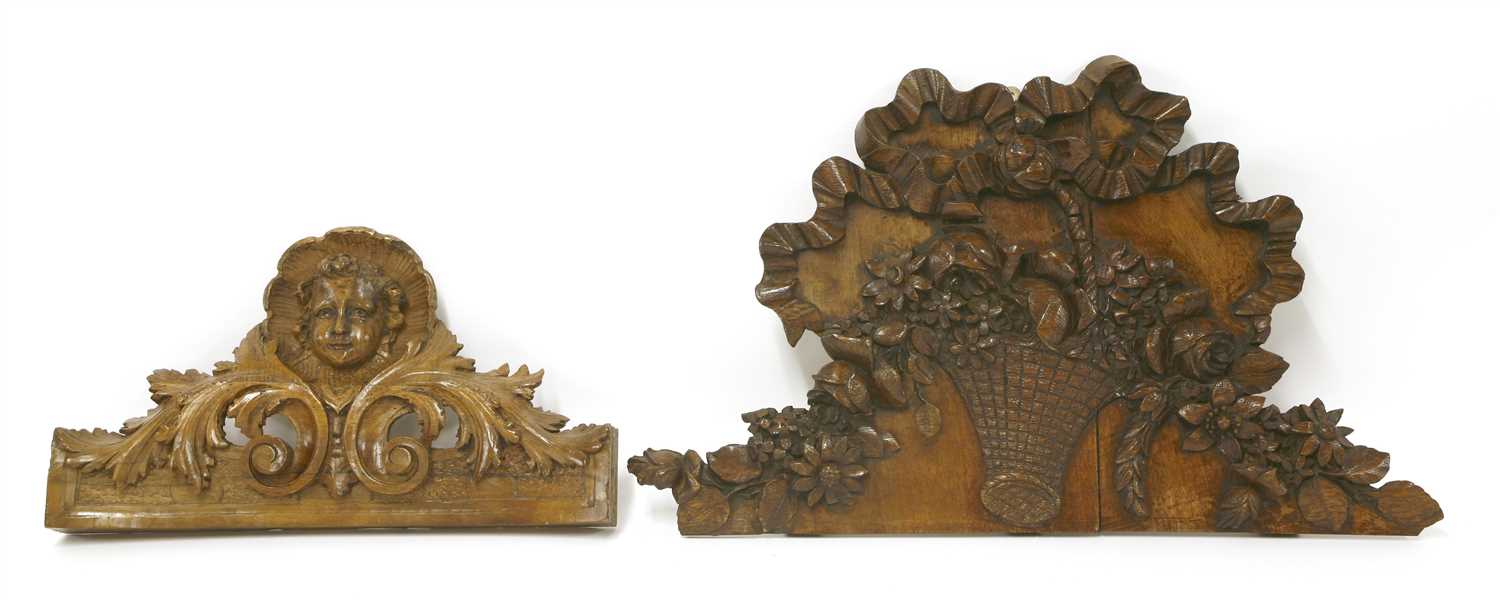 Lot 518 - A French walnut floral and fruit carving