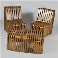 Lot 556 - A contemporary olivewood garden suite