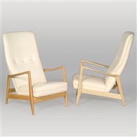 Lot 558 - A pair of ash lounge chairs