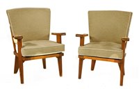 Lot 451 - A pair of oak lounge chairs