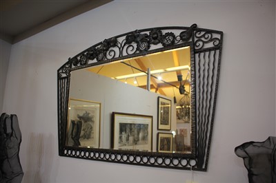 Lot 111 - A French wrought iron wall mirror