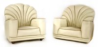 Lot 600 - A pair of Art Deco cream leather armchairs