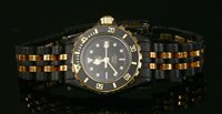 Lot 619 - A ladies' 'Black Coral' gold-plated Tag Heuer Diver's watch 1000 Professional, 200 metres