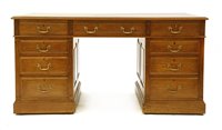 Lot 842 - An oak pedestal desk