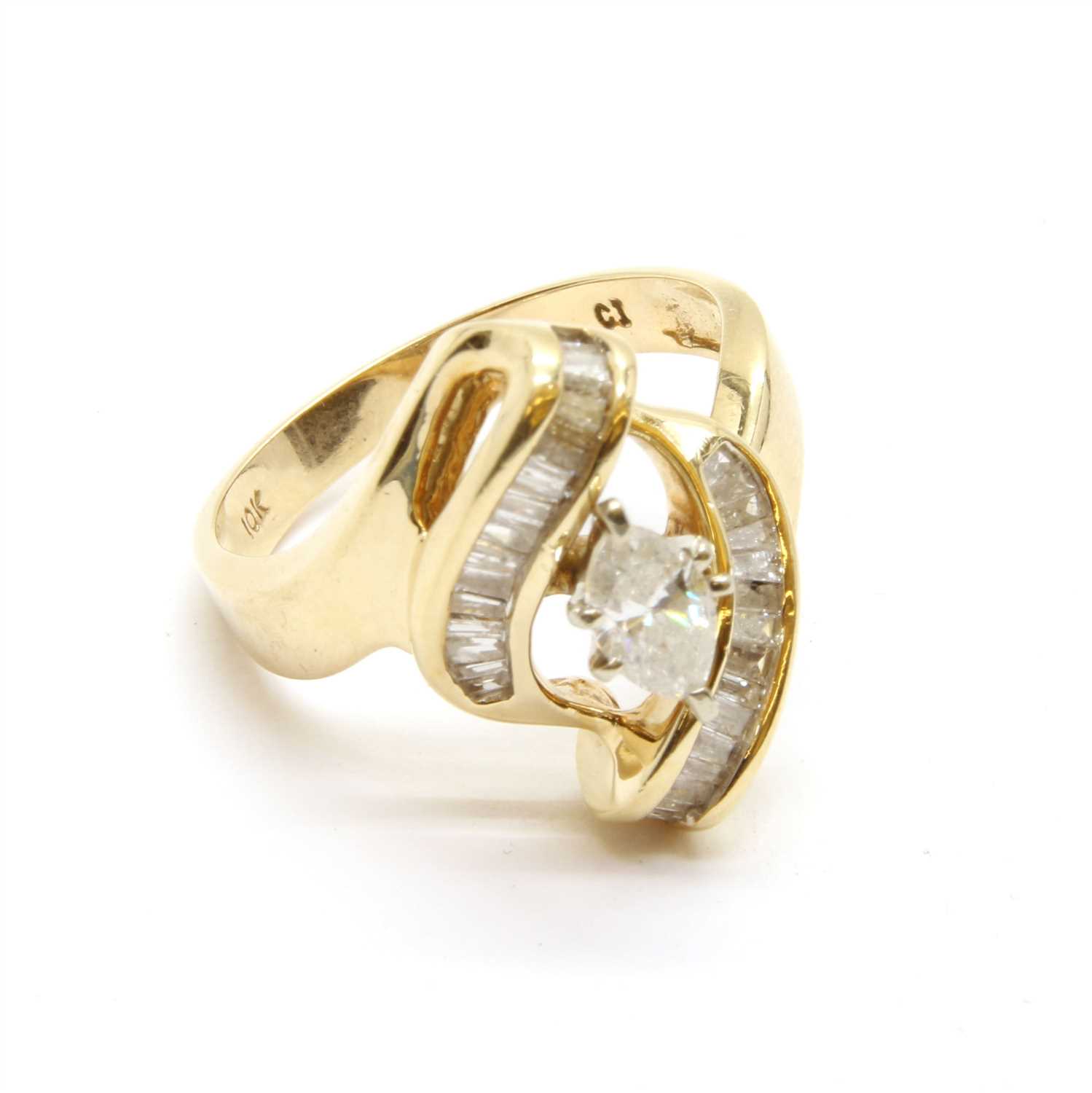 Lot 12 - An American single stone marquise cut diamond ring