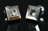 Lot 523 - A pair of 18ct white gold Happy diamond earrings by Chopard