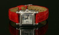 Lot 511 - A ladies' stainless steel Chopard 'Happy Sport' quartz strap watch