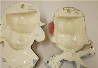 Lot 104 - Two Goldscheider pottery wall masks