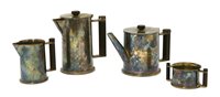 Lot 117 - A silver-plated four-piece tea set