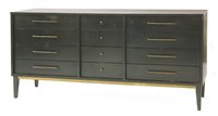 Lot 535 - An ebonised chest of drawers