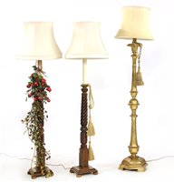 Lot 359 - A pair of mahogany standard lamps and shades
