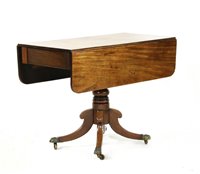 Lot 361 - A Regency mahogany drop leaf supper table