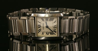 Lot 628 - A ladies' stainless steel Cartier Tank Française quartz bracelet watch, c.2001