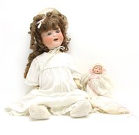 Lot 185 - Two Bisque head dolls
