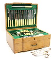 Lot 475 - An oak cased silver plated canteen of cutlery