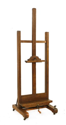 Lot 744 - An adjustable oak studio easel