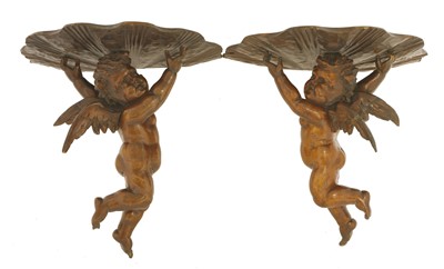 Lot 835 - A pair of Continental softwood wall brackets